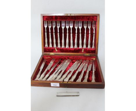 Cased set of twelve silver handled dessert knives and forks, together with a silver comb case 