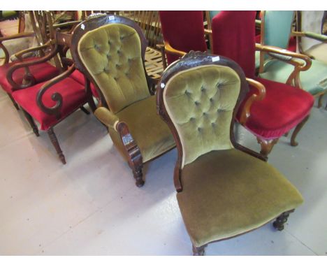 Victorian carved walnut and button upholstered open arm drawing room chair, together with a matching low seat nursing chair 