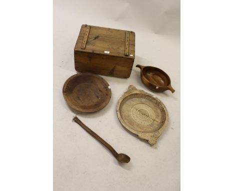 Small stripped pine box, with hinged lid, 19ins wide, together with three various wooden dishes and a ladle 
