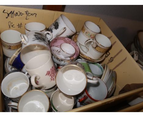 Box containing a quantity of miscellaneous decorative coffee cups and saucers 
