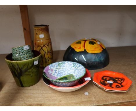 Quantity of various Poole pottery Delphis pattern items, to include shallow bowls, dishes, a wall pocket?, two vases and a ja