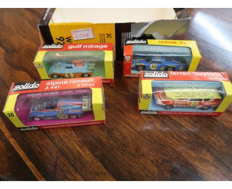 Four various Solido boxed diecast metal model racing cars 