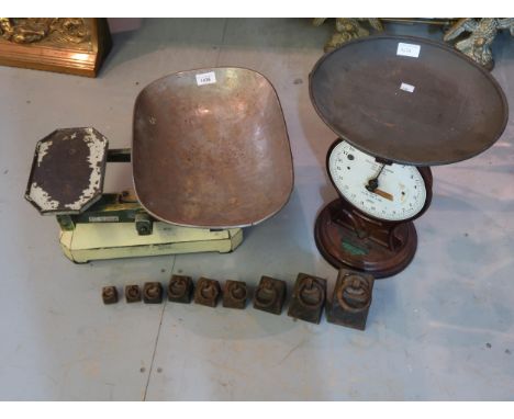 Two pairs of balance scales, graduated set of iron weights 