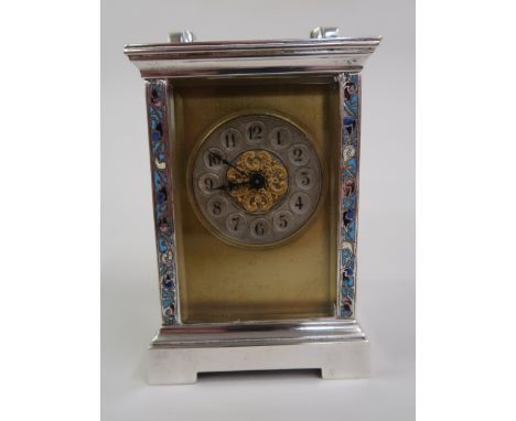 Small late 19th / early 20th Century silvered brass and champleve enamel decorated carriage clock, the gilt and silvered dial
