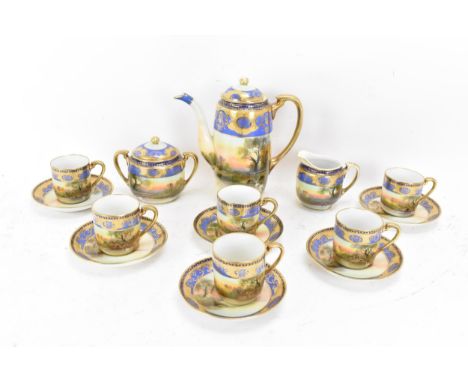 An early 20th century Japanese Noritake porcelain coffee service, each painted with a continuous scene of a lake, the coffee 