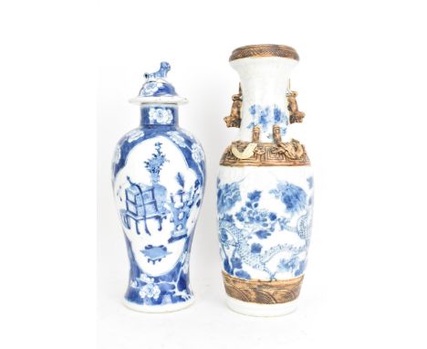 Two Chinese Qing dynasty vases, late 19th century, to include a blue and white baluster lidded vase decorated with prunus flo