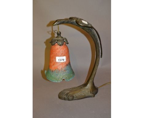 Reproduction Art Deco style bronzed metal table lamp in the form of a stylised bird with mottled glass shade