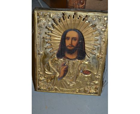 Small gilt metal mounted icon painted with a portrait of Christ