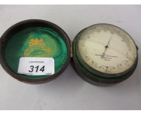 Late Victorian brass circular travel barometer by Negretti & Zambra, with original leather outer case
