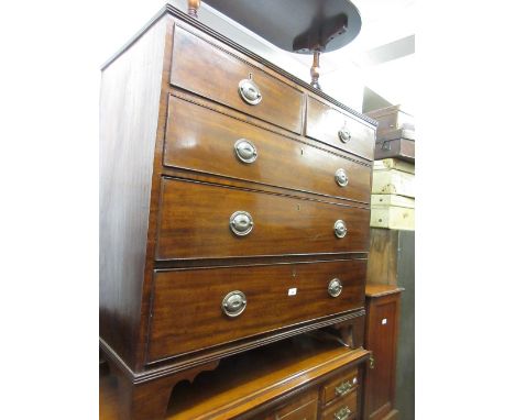 Late George III mahogany straight front chest of two short and three long drawers with oval brass handles and bracket feet