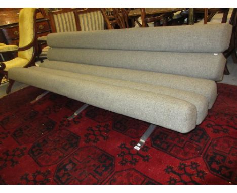 William Plunkett ' Kingston ' sofa, upholstered in grey fabric above an aluminium frame CONDITION REPORT Slight wear to one e