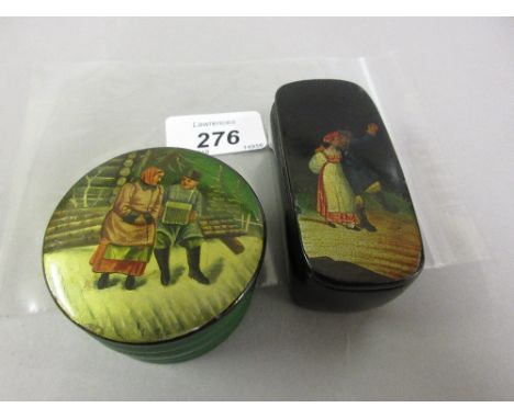 19th Century Russian papier mache snuff box, the cover painted with peasant figures with gold eagle mark to inner cover, toge