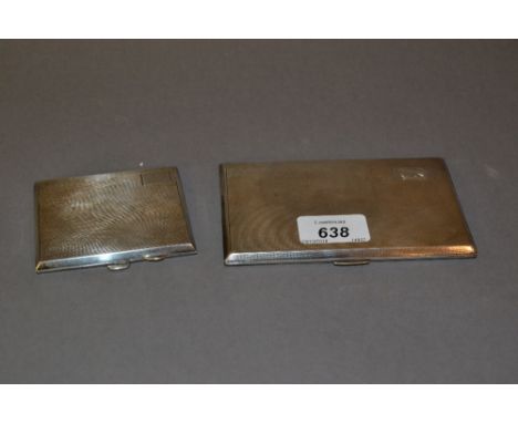 Birmingham silver double cigarette case with engine turned decoration and a similar smaller cigarette case