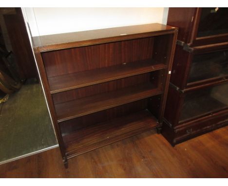 Pair of reproduction mahogany three shelf open bookcases together with a similar standing corner cabinet