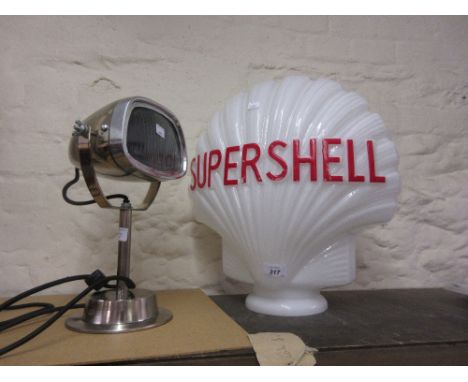 Reproduction ' Shell ' glass petrol pump globe together with a cast spotlight mounted as a table lamp CONDITION REPORT Good c