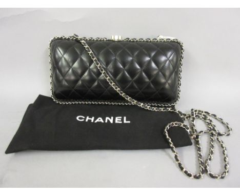 Ladies small Chanel black quilted handbag CONDITION REPORT The bag is in good condition internally, the catch is working. Ext