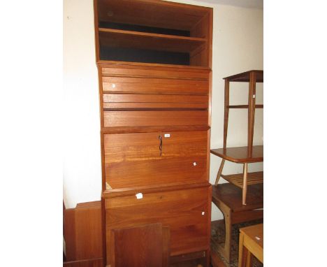 Mid 20th Century Ladderax type teak wall shelf unit comprising: various cabinets and shelves including sliding door and drop 