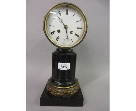 19th Century French black slate and ormolu drum form pillar clock, the enamel dial with Roman numerals inscribed Hry. Marc, P