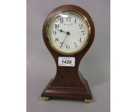 Edwardian mahogany line inlaid balloon shaped mantel clock with circular enamel dial having Arabic numerals, the dial inscrib