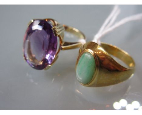 9ct Gold jade set ring and a 9ct gold amethyst ring