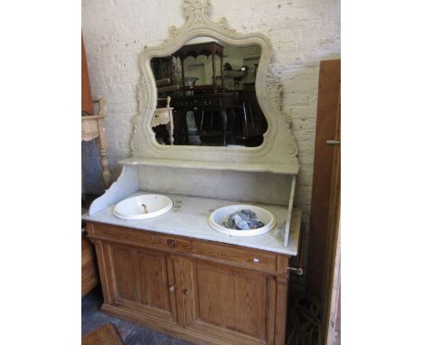 Victorian and later pine and marble twin sink vanity unit, the shaped carved marble back with a mirror insert above a marble 