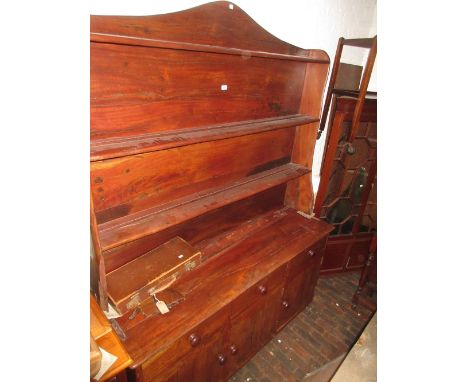 Large 20th Century reclaimed hardwood dresser, the boarded shelf back above three drawers and three cupboard doors with knob 