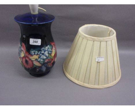 Moorcroft floral tube lined pottery table lamp on a blue ground