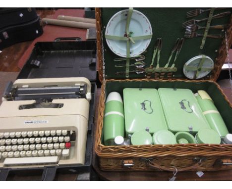 Wicker picnic hamper by Coracle together with a cased typewriter