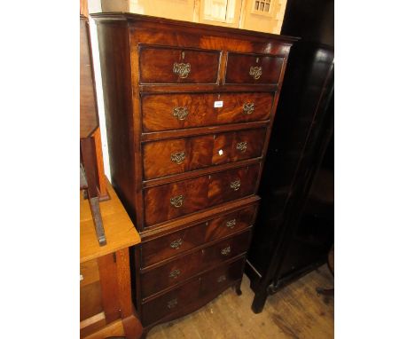 Small mid 20th Century mahogany tallboy with a moulded top above two short and six long graduated drawers with brass handles 