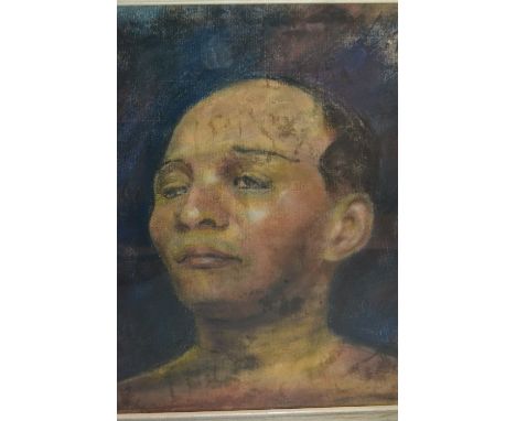 Framed pastel drawing, head and shoulder portrait of an African gentleman, indistinctly signed, 13ins x 11ins