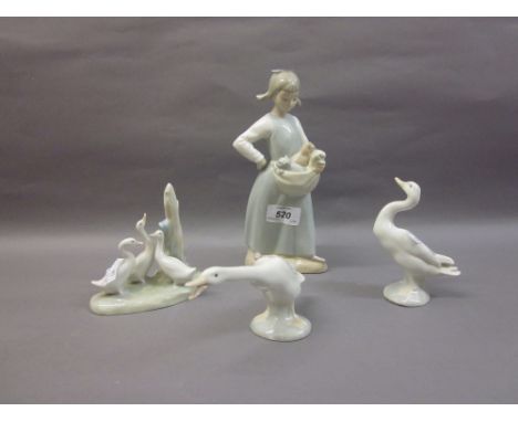 Nao figure of a girl holding kittens, Nao figure of geese and two Lladro figures of geese