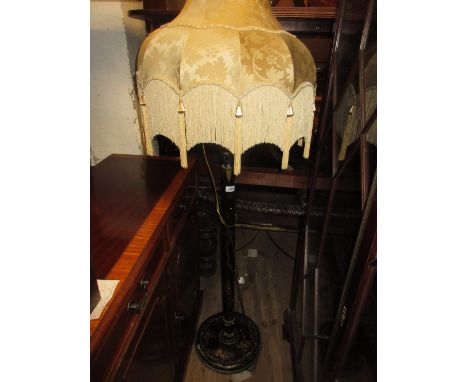 Black chinoiserie decorated standard lamp together with a 1930's rectangular oak wall mirror