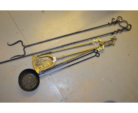 Various brass and iron fire tools