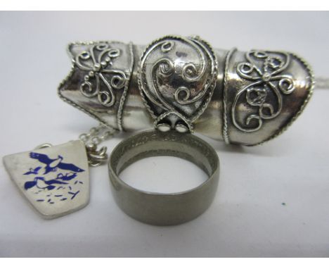 Danish silver and enamel pendant necklace together with a silver articulated ring and another ring formed from a coin