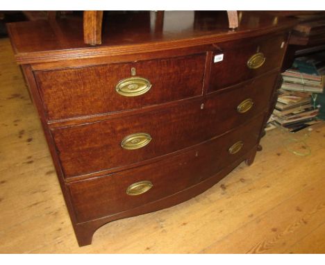 19th Century mahogany bow front chest of two short and two long drawers with oval brass handles and bracket feet