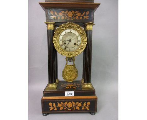 19th Century French rosewood marquetry inlaid portico clock, the silvered dial with gilded bezel, with a two train movement s