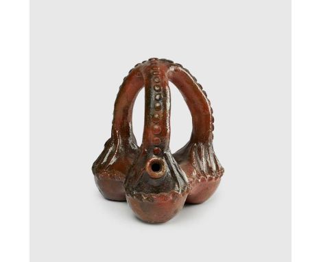 sand tempered ceramic, in the form of a basket, with three spherical receptacles each with a single handle meeting at the top