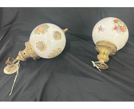 A pair of globe wall hanging light fittings 