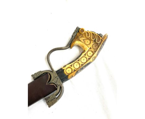 Fine antique Omani made Arab Nimcha sword, total length 99cm, scabbard leather is a replacement but retains original silver f