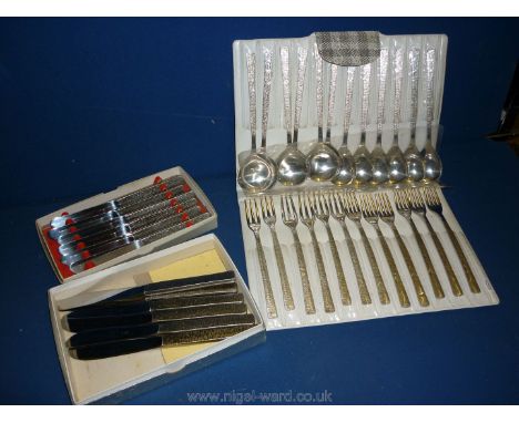 A Thirty Six Piece Set of '60's Bark Handled Scandinavian Design Cutlery Inc. Soup and Dessert Spoons, Dinner and Tea Knives 