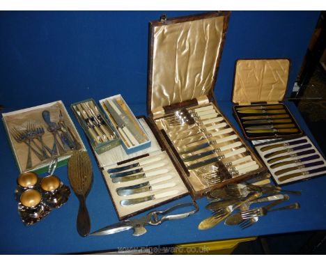 A quantity of Epns cutlery to include fish knives and forks boxed, plated egg cups, miscellaneous fruit knives, bread and but