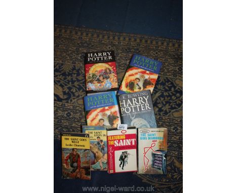 Four First Edition Harry Potter books along with four Leslie Charteris The Saint books