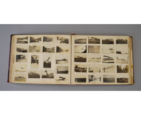 An interesting First World War photographic scrap book with images from Middle East and North Africa with automobile, aircraf