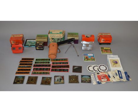 Collection of assorted slides and viewers including Magic Latern slides, mostly caricatures 