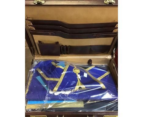 A collection of Masonic items in a brown leather case, &nbsp;including regalia relating to early 1970's; Worshipful Master of