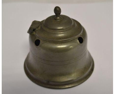 An early 19th Century pewter inkwell, with liner and quill holder, in the form of a bell, height approx. 8cm.