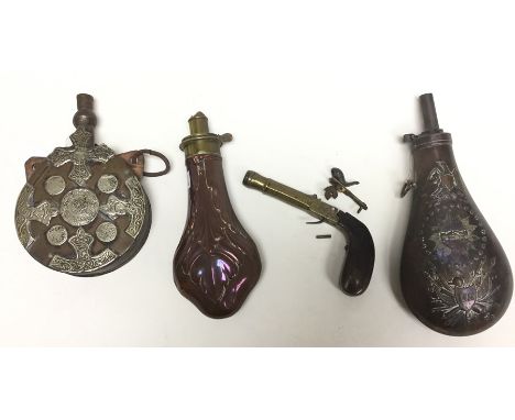 A collection of three powder flasks and a brass barrel percussion cap pocket pistol: Pistol has 7cm barrel, overall length 15