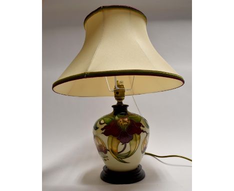 A modern Moorcroft table lamp, with shade, height to top of lamp, approx. 27cm, with shade, approx. 44cm.