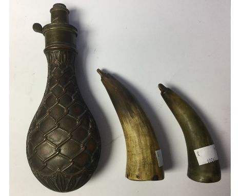 Two Horn Powder Flasks, one approx 12cm in length, the other approx 10cm in length, each with wooden base and horn stoppers. 