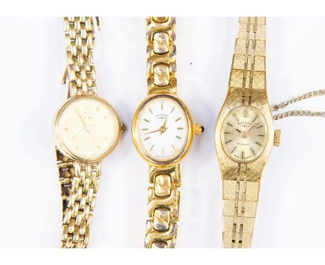 A 9k gold Rotary ladies wristwatch, total gross weight approx. 13.8gms along with two other gilt metal versions (3)
